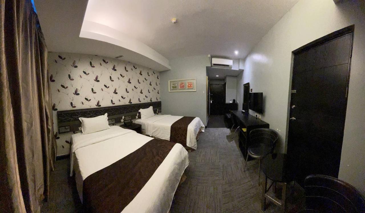 Hotel De Leon Lahad Datu Habitación foto